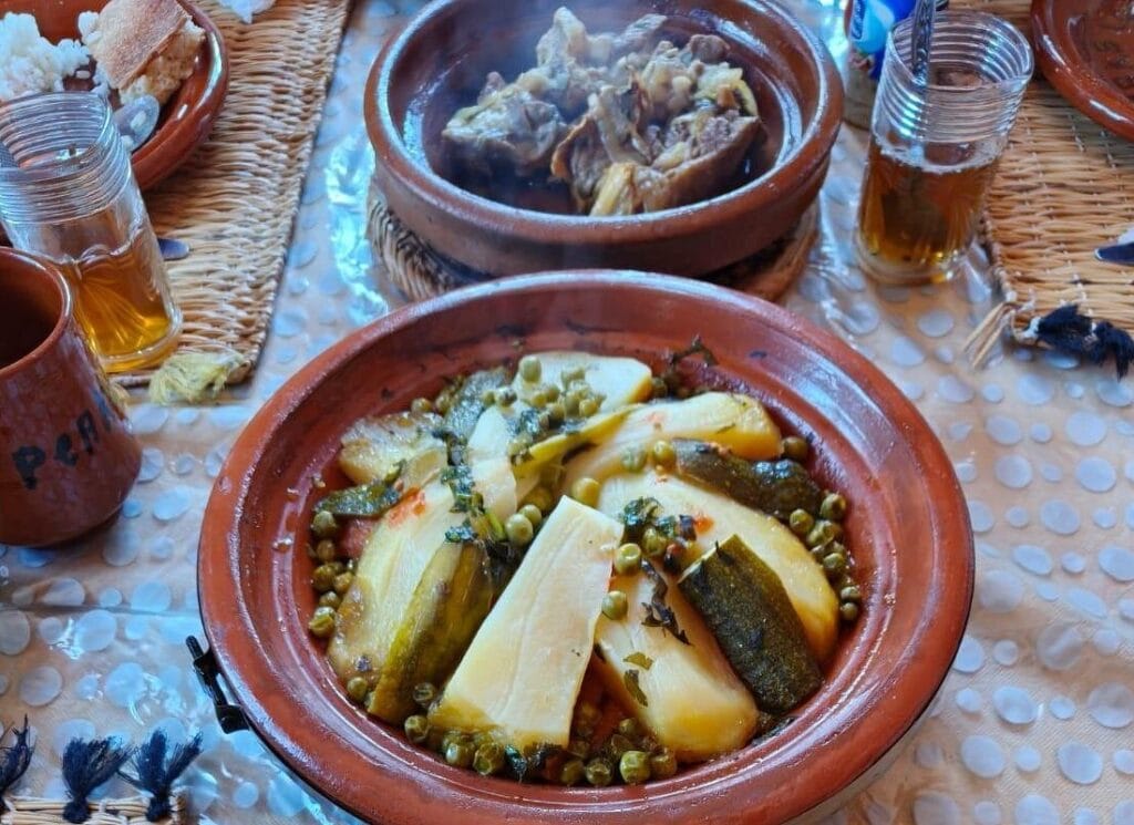 Traditional Moroccan tagine cooking experience with local Berber family in Imlil Atlas Mountains