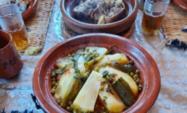 Traditional Moroccan tagine cooking experience with local Berber family in Imlil Atlas Mountains